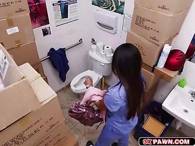 Camera hidden in toilet films her pussy while she stuffs it with pants!