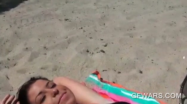 Teen cutie in swim suit flashing sexy butt at the beach